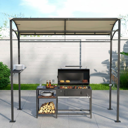 Grill gazebo with a barbecue grill, plates, and bottles on a patio